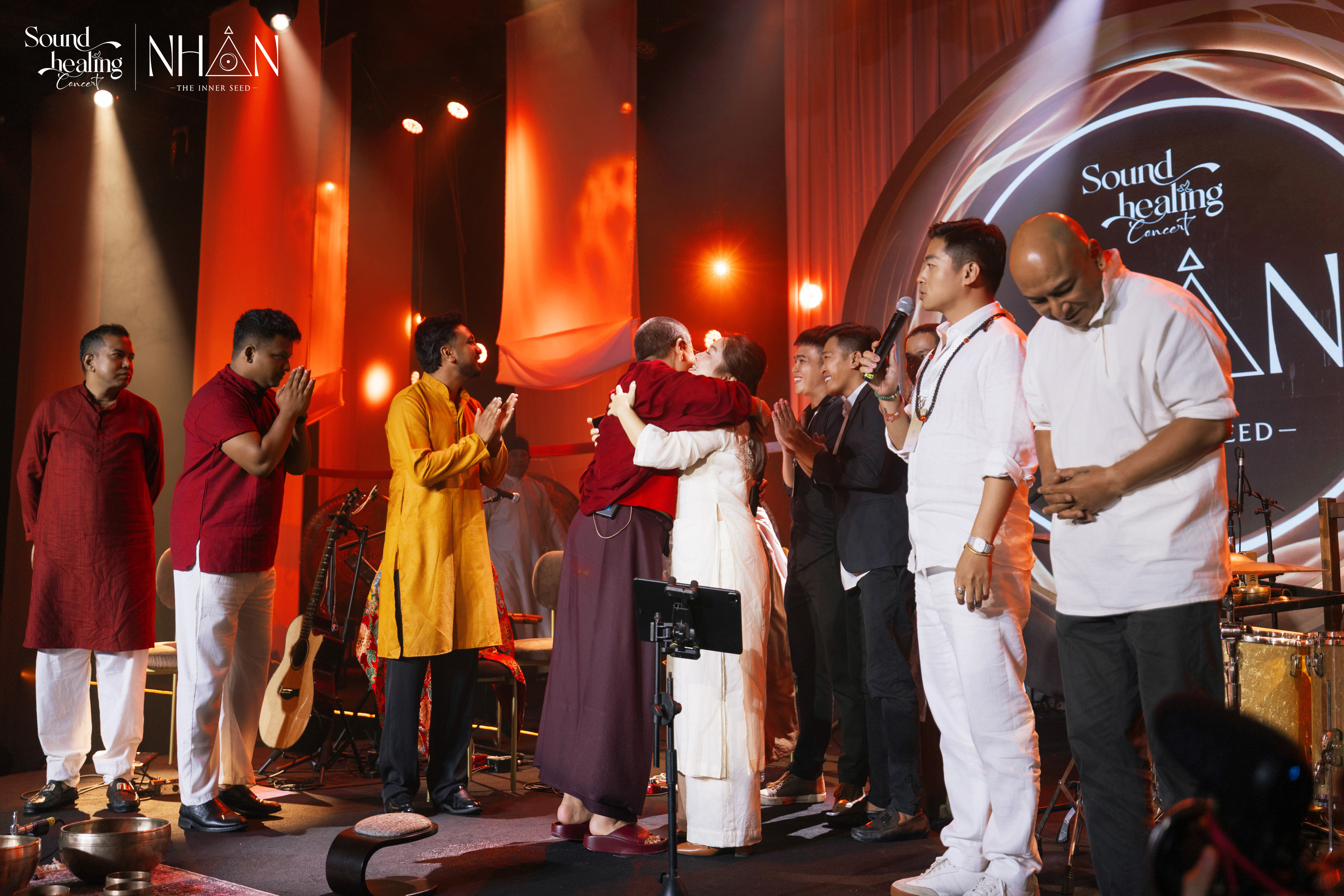 Ani Choying Drolma and an audience member on stage — a moment of connection